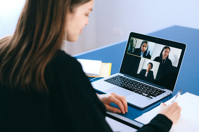 A lady having a virtual meeting