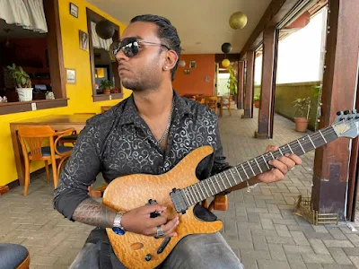 " Ashish Algoe guitarist from Surinamese Indian musical band Heat"