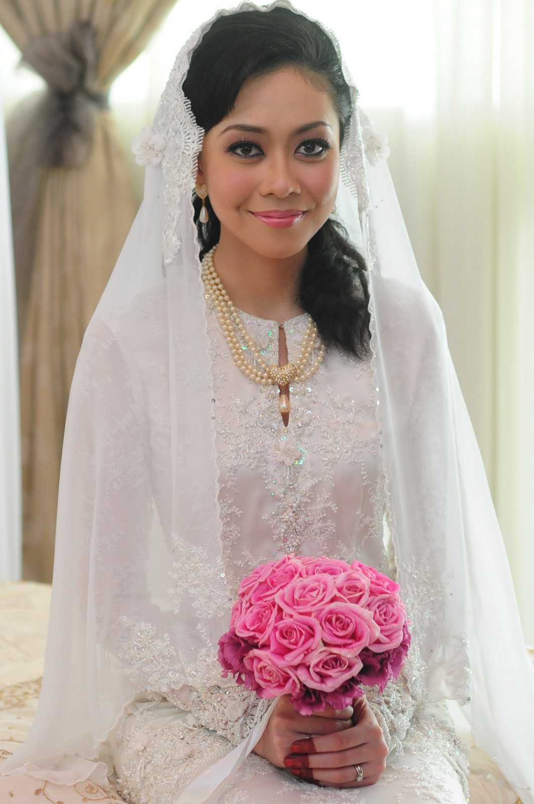qudyn Zaza s wedding dress for nikah  and reception ceremony