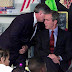 The moment when George Bush was notified of the attack on the Twin Towers.