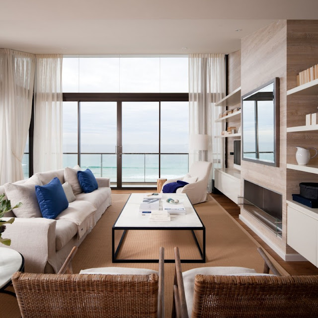 Photo of modern living room furniture by the window with the view