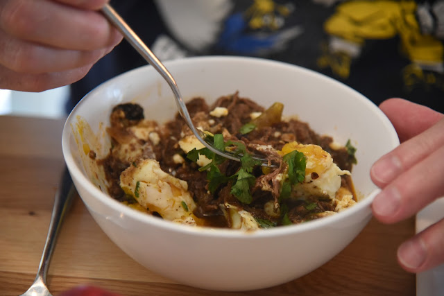 breakfast barbacoa made with leftover chipotle beef or barbacoa, cotija cheese, eggs and cilantro