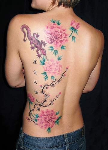 By the way Jasmine flower Man's left side was tattooed