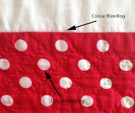 Red dye bleeding onto white fabric Colour Catcher