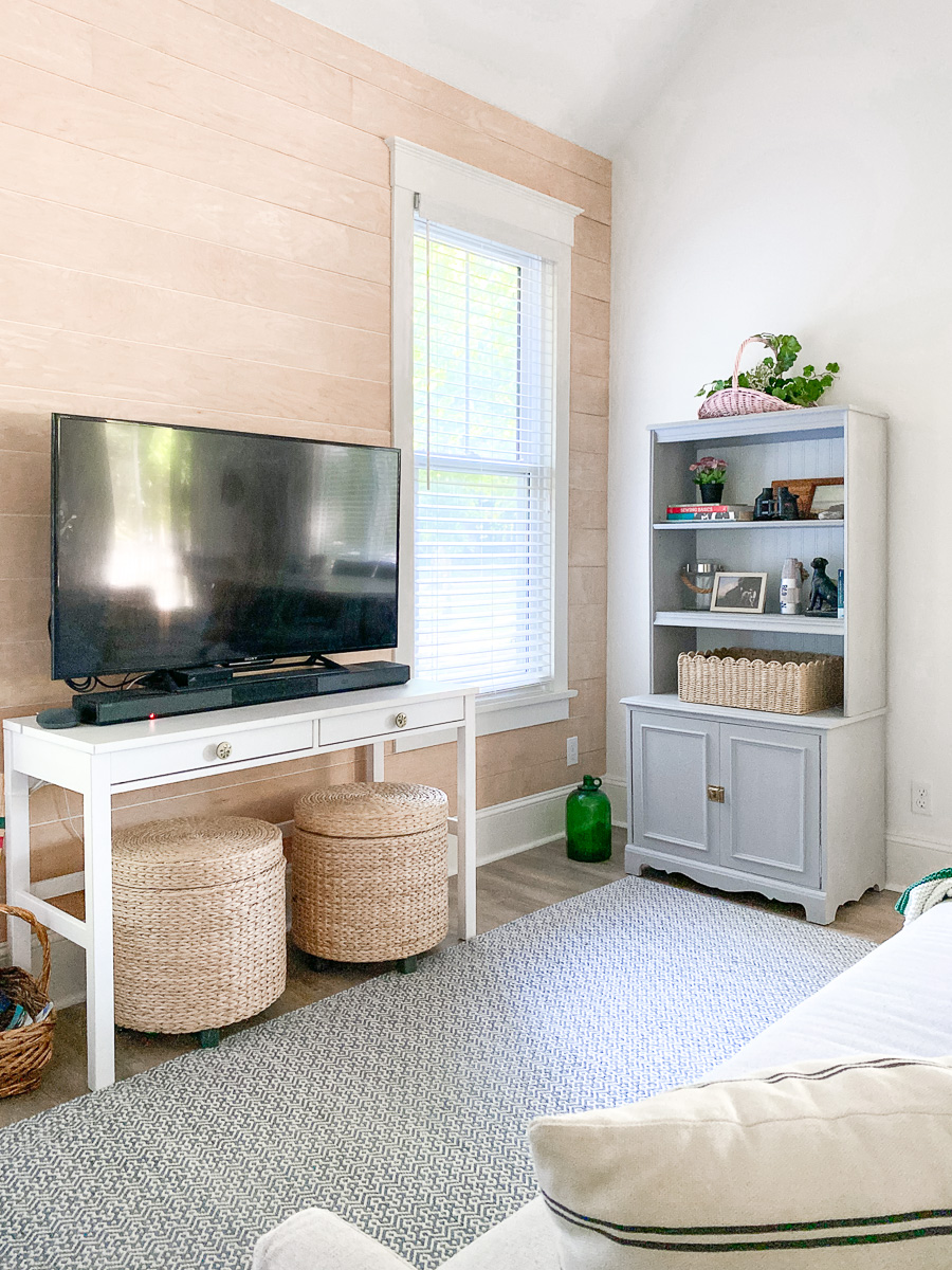 cottage living room with shiplap wall