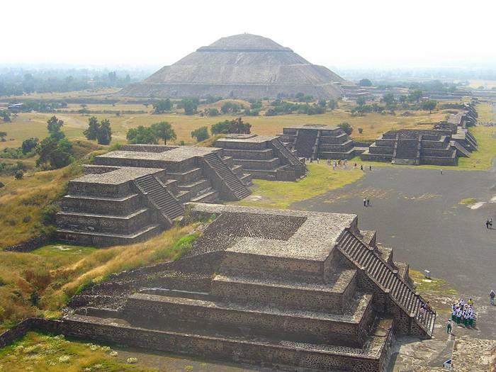 Pyramid of the Sun, It was massive, one of the first great cities of the Western Hemisphere. And its origins are a mystery. It was built by hand more than a thousand years before the swooping arrival of the Nahuatl-speaking Aztec in central Mexico. But it was the Aztec, descending on the abandoned site, no doubt falling awestruck by what they saw, who gave it a name: Teotihuacan. A famed archaeological site located fewer than 30 miles (50 kilometers) from Mexico City, Teotihuacan reached its zenith between 100 B.C. and A.D. 650. It covered 8 square miles (21 square kilometers) and supported a population of a hundred thousand, according to George Cowgill, an archaeologist at Arizona State University and a National Geographic Society grantee.