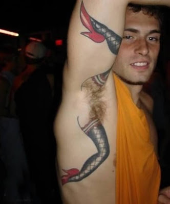 En zeg nou zelf: onderstaande tattoo is zeker fantasierijk gevonden.