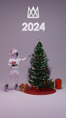 An astronaut decorates a Christmas tree.