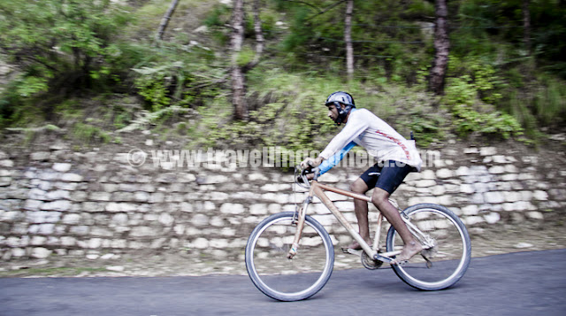 Mountain Terrain Biking, Himachal Pradesh 2011 - Day 3 - Tani Jubber to  Kullu Sarhan  a farmer from Maharashtra, passionate rider and runner up in Master's category of Mountain Terrain Biking 2010 as well as 2011 !!! He always ride bare feet and it seems he has not been using any footwear for last 16 years...