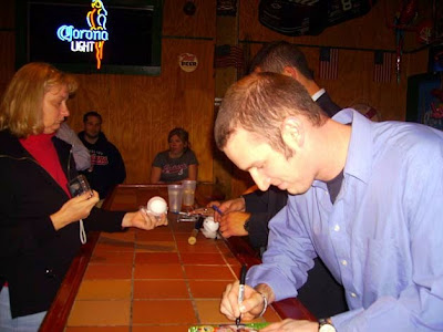 Jensen Lewis autographing my DVD of MAJOR LEAGUE at Stamper's Bar & Grill in Fairview Park during the Indians Press Tour — 24 January 2008 — Taken by Cathy