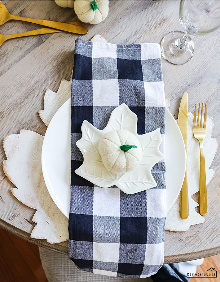 Black and white buffalo check napkins and leaf plates