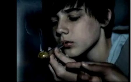 By the way, here's the photo of Justin Bieber smoking weed: