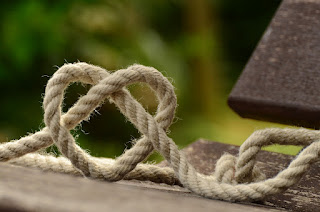 A rope, knotted such that the knot makes a heart shape.