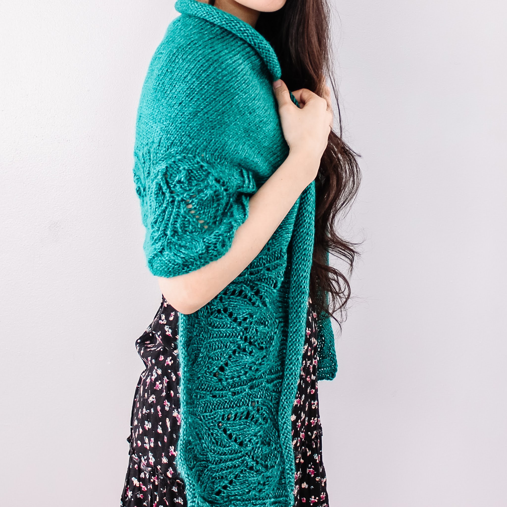 Modesty by Laura designer wearing the knit Emerald Shawl.