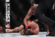 Silva finishing Bonnar (photo by MMA Fighting)
