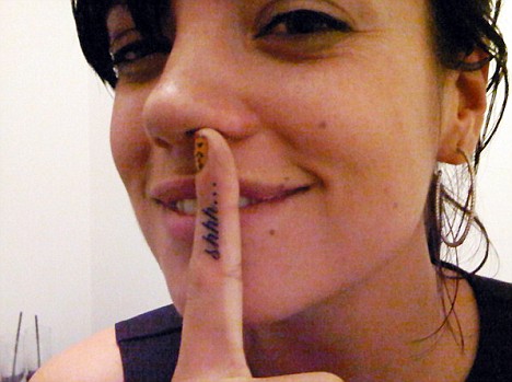 women tattoo on finger tattoos