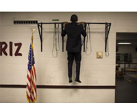 Barack Obama doing pull-ups, source unknown