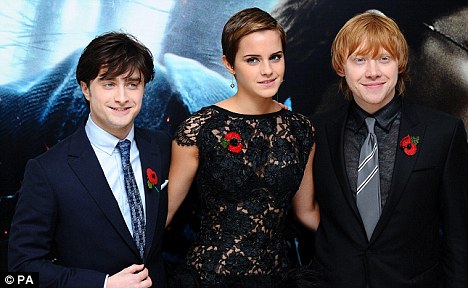 Not so fast: The three stars, pictured at last month's Deathly Hallows: Part 