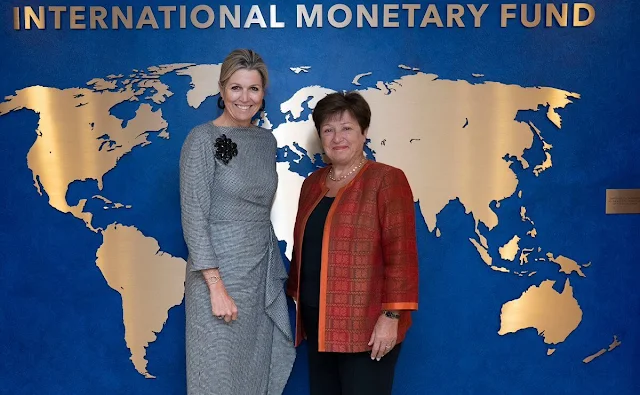 Queen Maxima wore a plaid check ruffled midi dress by Natan. International Monetary Fund Managing Director Kristalina Georgieva