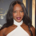 Naomi Campbell Flaunts Hourglass Figure In Striking Gown At Paris Fashion Week