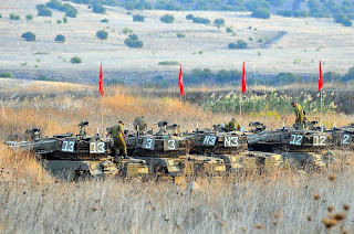 israeli tanks in golan heights near border with syria