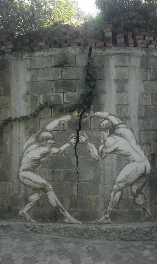 street art breaking the wall