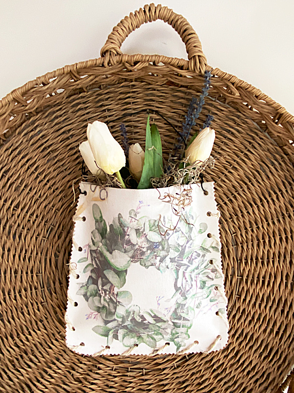 basket with pouch of faux flowers