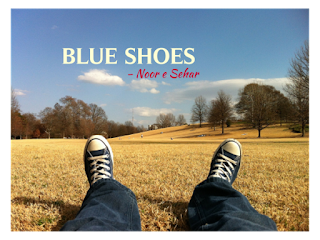 image contains 1 pair of blue shoes