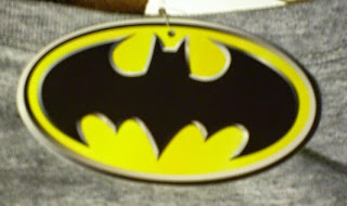 Front of gray distressed Batman t-shirt label