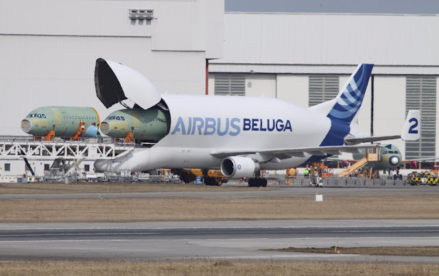 A300-600 ST Beluga Unloads Airbus A320