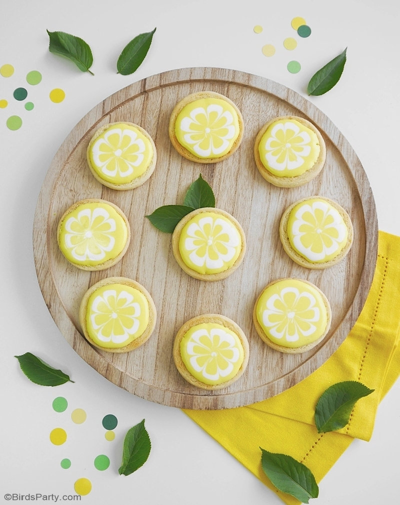 Lemon Decorated Sugar Cookies - easy recipe for a lemon shaped sweet treat that's perfect for a lemon themed wedding, birthday or summer party! by BirdsParty.com @birdsparty #cookies #lemoncookies #decoratedcookies #lmeonsugarcookies #sugar cookies #lemondecoratedcookies #lemonrecipes #lemonparty #lemonpartyfood