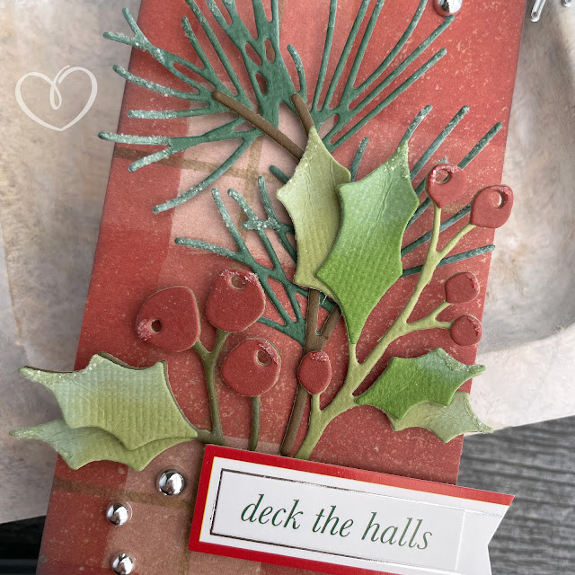 Christmas gift tags made with patterned paper, cardstock, Scrapbook.com Peppermint Christmas Sticker Book, Tim Holtz Sizzix Festive Foliage die, Distress Oxide ink and Distress Rock Candy Glitter.