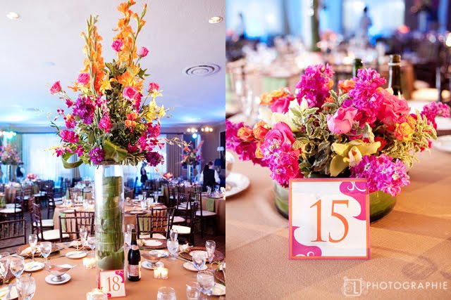 The tall centerpieces were a leafwrapped cylinder with a tropical flower 