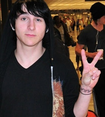 Mitchel Musso flashed a peace