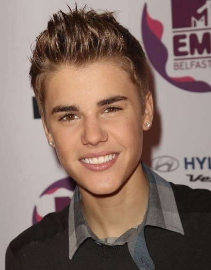 or does Justin Bieber's new haircut combined with those earrings 