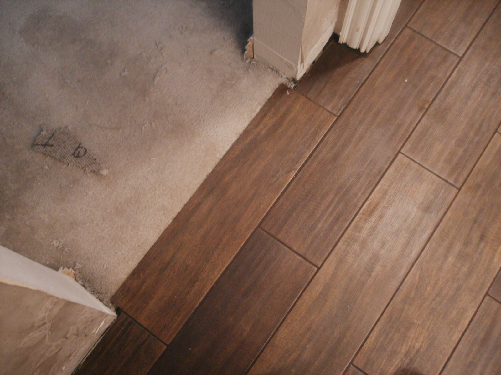 "Is It Wood Flooring?" or "Is It Porcelain Tile ...