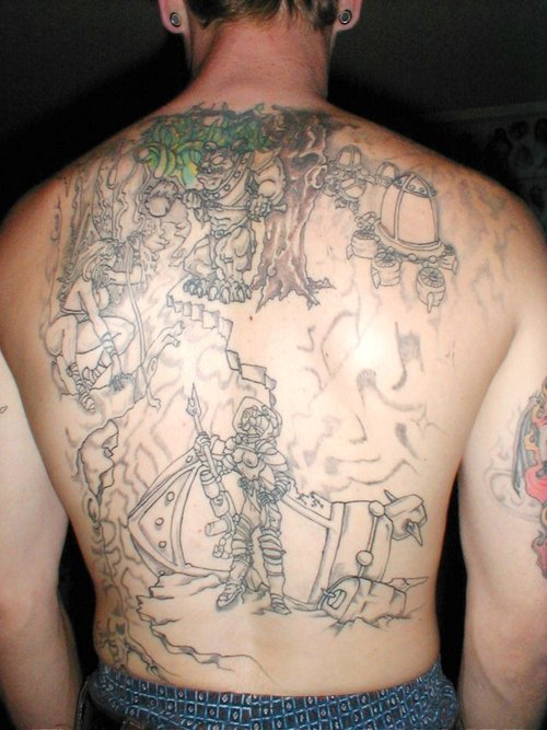 Upper Back Tattoo For Men. men upper back tattoo