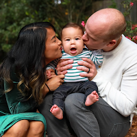 New parents with their newborn baby girl