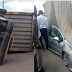 Container Falls On Woman’s Car Moments After Stepping Out With Her Baby.