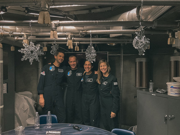 Polaris Dawn astronauts Jared Isaacman, Scott Poteet, Sarah Gillis and Anna Menon pose for a group photo during their decompression sickness study at NASA's Johnson Space Center last December.