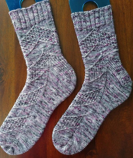 Adult sized, textured socks knit with speckled yarn.  Free pattern on Ravelry.