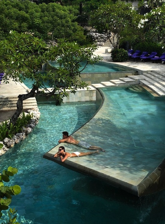 Sunbathing In Glamorous Tropical Pool