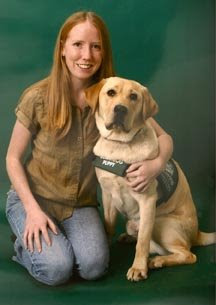 Cristen Phillips with a Guide Dog puppy