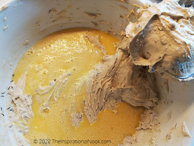 Add eggs to caraway cake batter