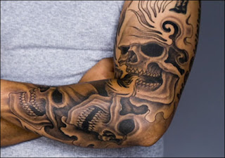 tattooed skull shoulder tattoo ideas