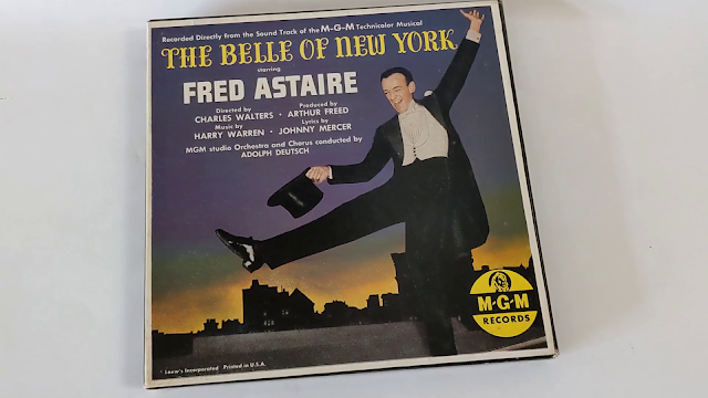 picture of album cover with man dancing in a tuxedo