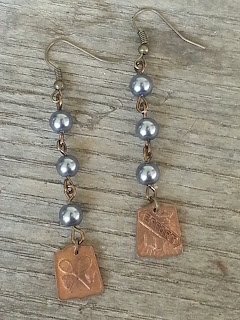 assemblage earrings with recycled pearls and antique school medals