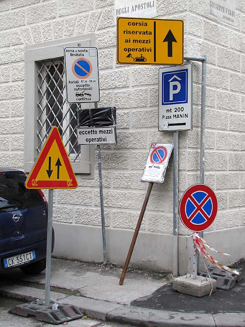 A mess of road signs, Livorno