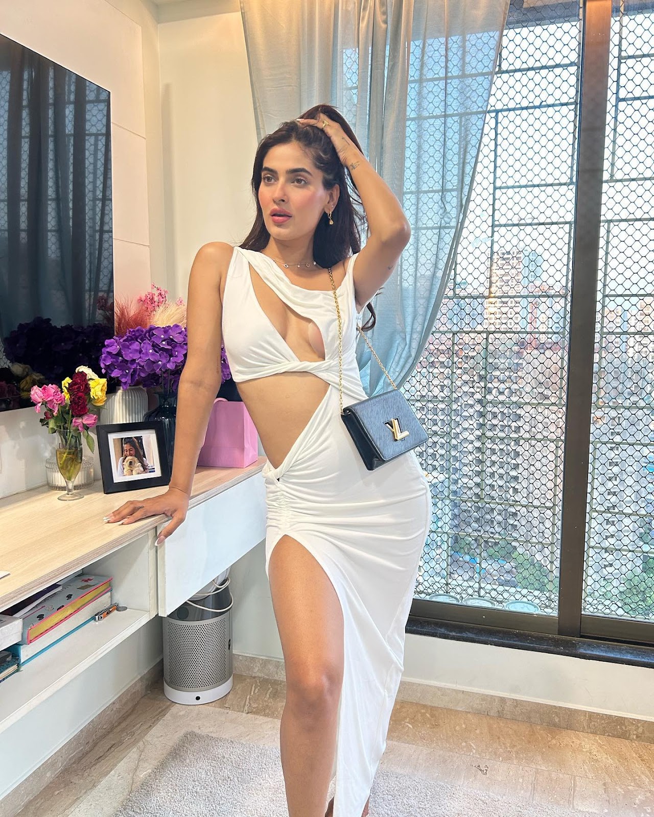 Karishma Sharma high slit white dress sexy legs