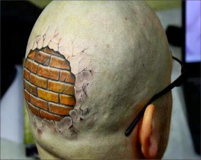 Tattoo with a hard head brick effect